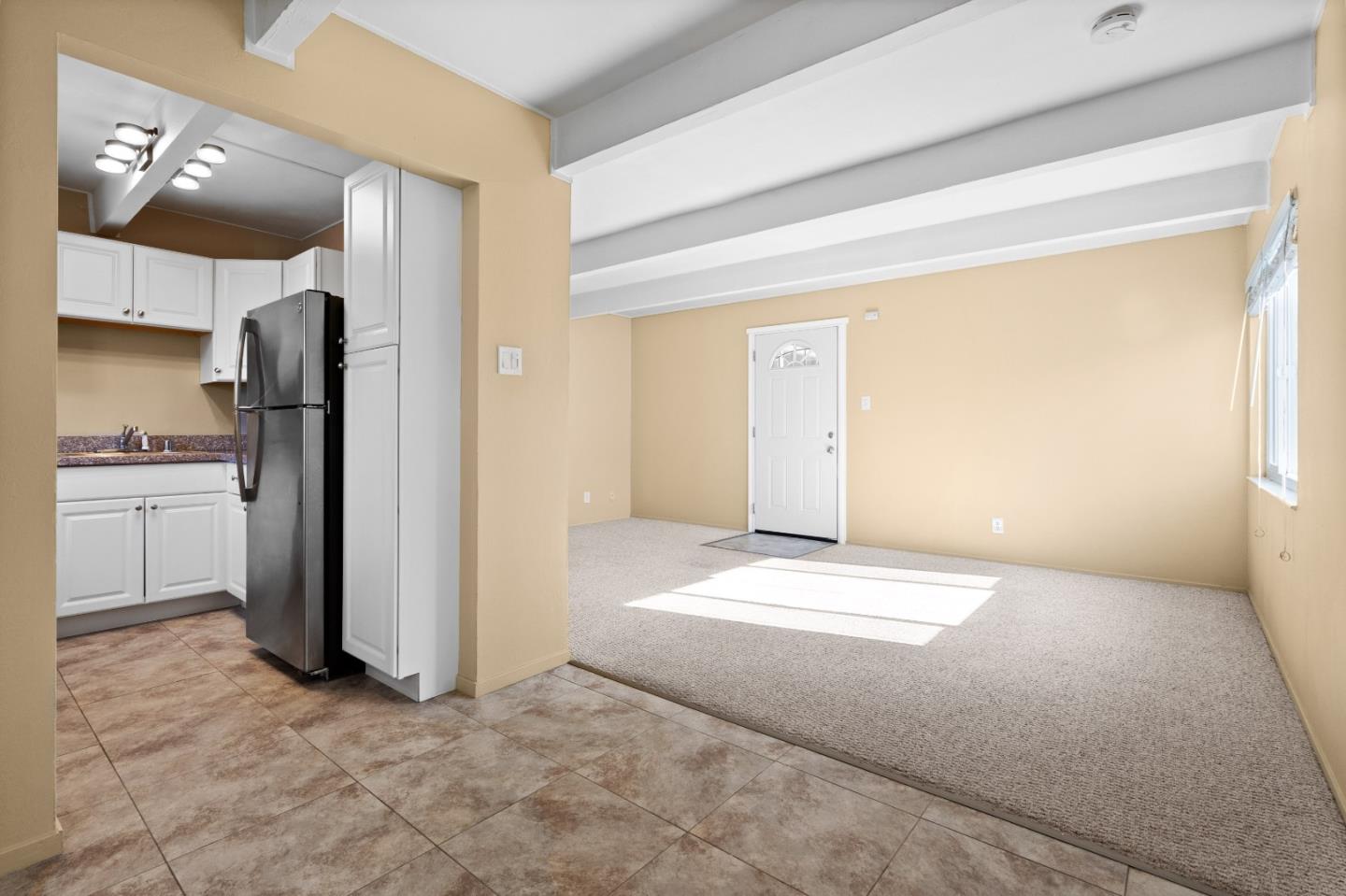 4 Coleman Place Menlo Park, CA 94025 - Photo 20 of 34 a view of a kitchen with a refrigerator and a sink