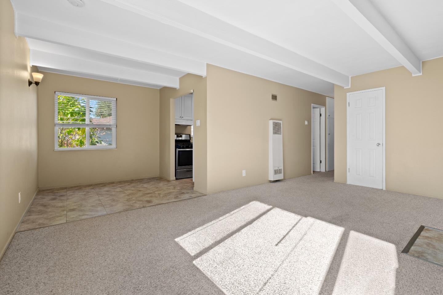 4 Coleman Place Menlo Park, CA 94025 - Photo 23 of 34 a big room with windows and a wooden floor