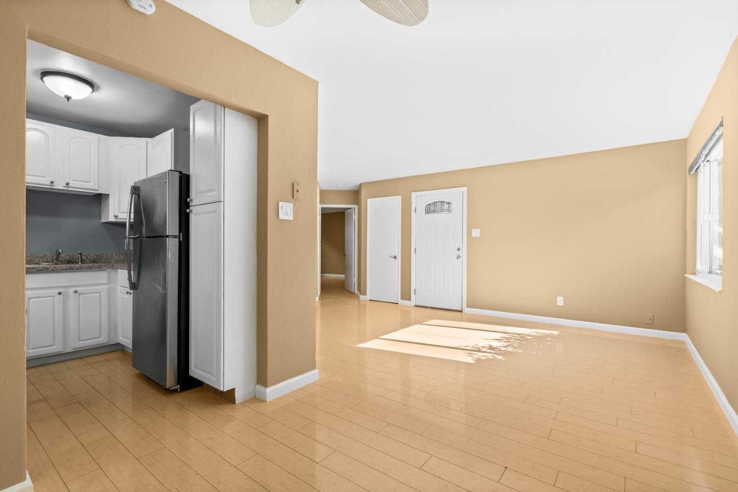 4 Coleman Place Menlo Park, CA 94025 - Photo 26 of 34 a view of a kitchen with a sink and a refrigerator