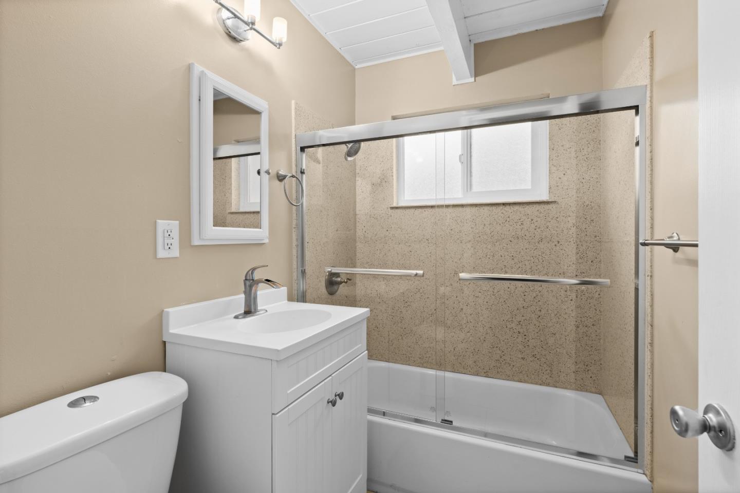 4 Coleman Place Menlo Park, CA 94025 - Photo 31 of 34 a bathroom with a sink a mirror toilet and bathtub