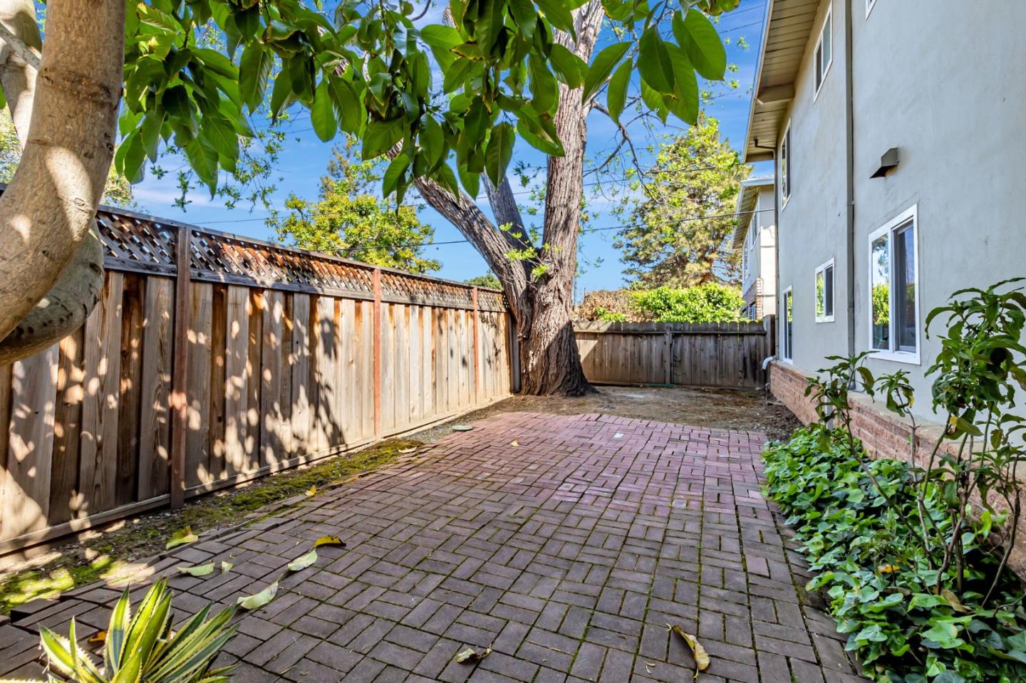 4 Coleman Place Menlo Park, CA 94025 - Photo 32 of 34 a street view with wooden fence