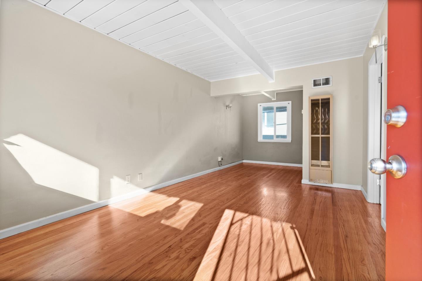 4 Coleman Place Menlo Park, CA 94025 - Photo 10 of 34 a view of an empty room with wooden floor and a window