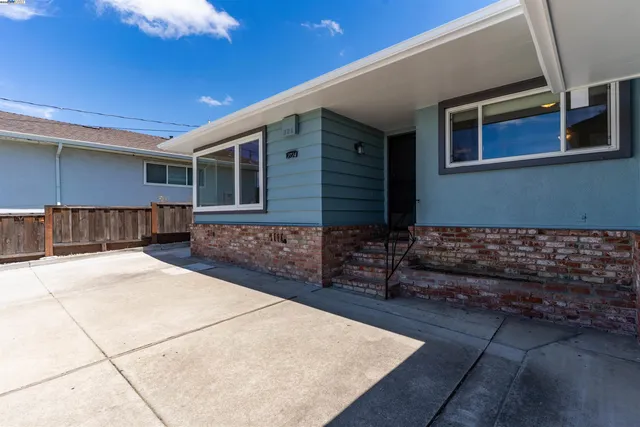 a front view of a house with yard