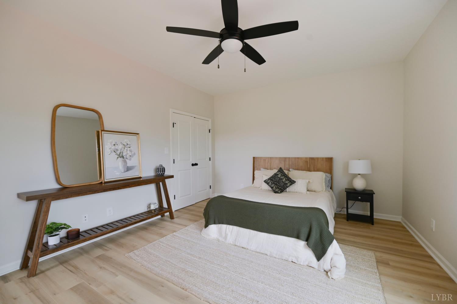 1843 Crockett Road Forest, VA 24551 - Photo 15 of 32 main level primary bedroom with dual closets