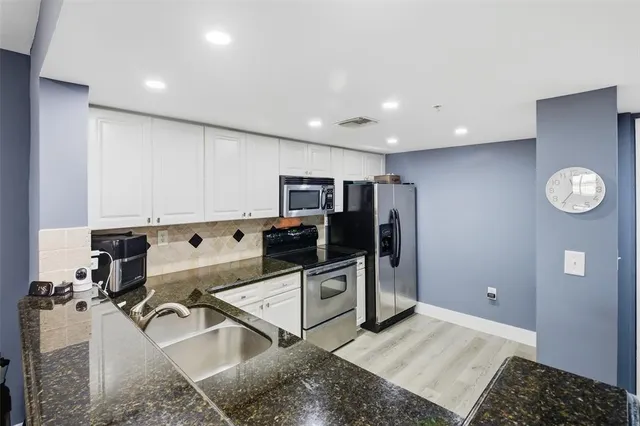 a view of a room with windows