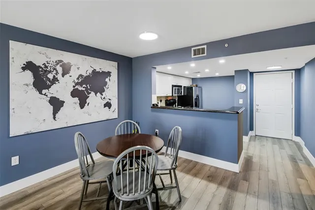 a view of a hallway with washer and dryer