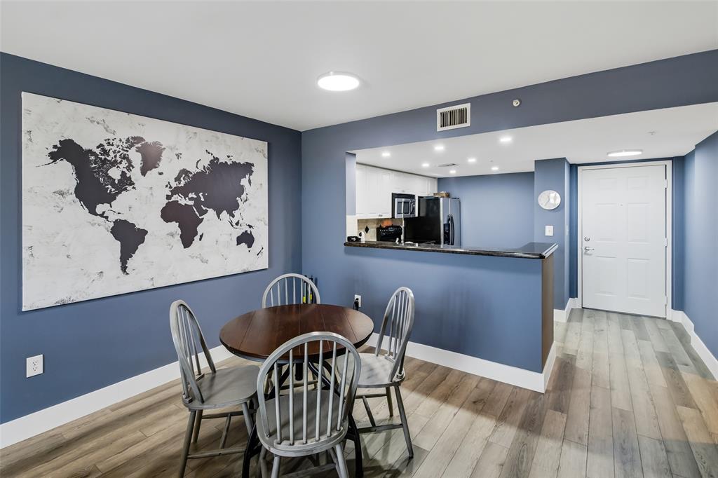 520 Southeast 5th Avenue, Unit 3208 Fort Lauderdale, FL 33301 - Photo 18 of 71 a view of a dining room with furniture and wooden floor