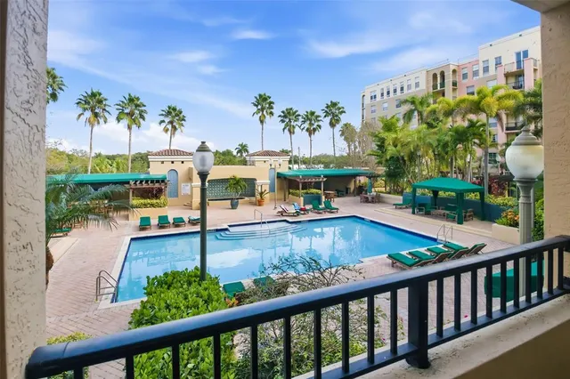 a bathroom with a double vanity sink a toilet and mirror