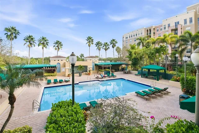 a bathroom with a white bath tub and a shower curtain
