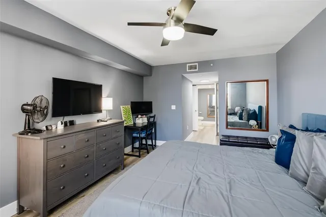 a view of a swimming pool with a lounge chairs