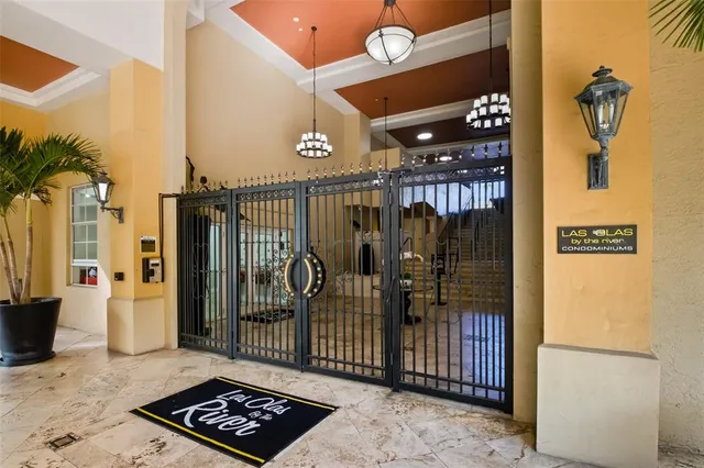 a kitchen with granite countertop a stove top oven sink and cabinets