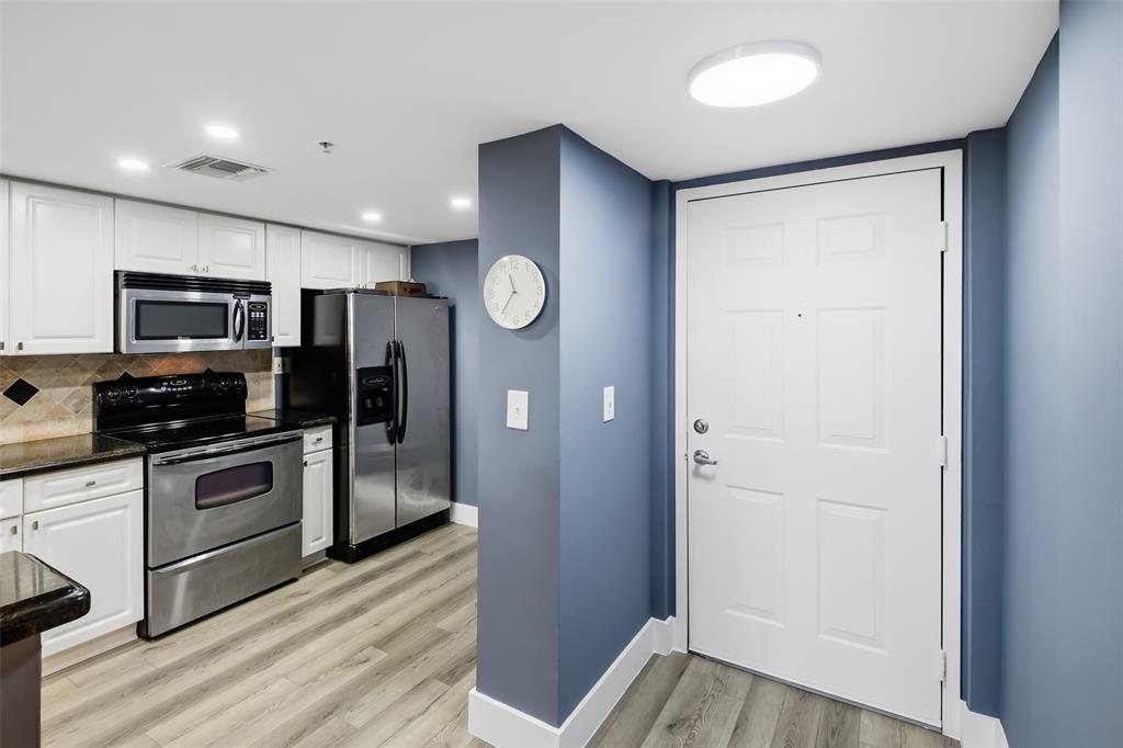 520 Southeast 5th Avenue, Unit 3208 Fort Lauderdale, FL 33301 - Photo 10 of 71 a kitchen with stainless steel appliances granite countertop a refrigerator and a stove top oven