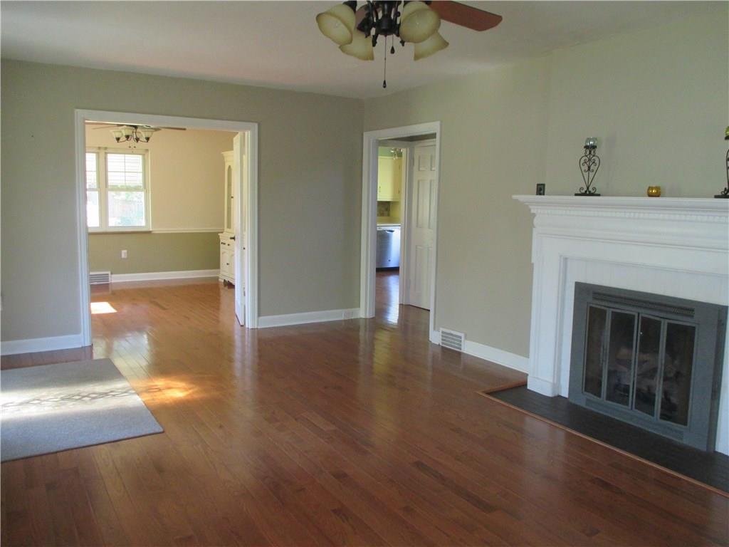 1900 Tuscarawas Road Beaver, PA 15009 - Photo 3 of 25 Living Room with view of dining room and kitchen.