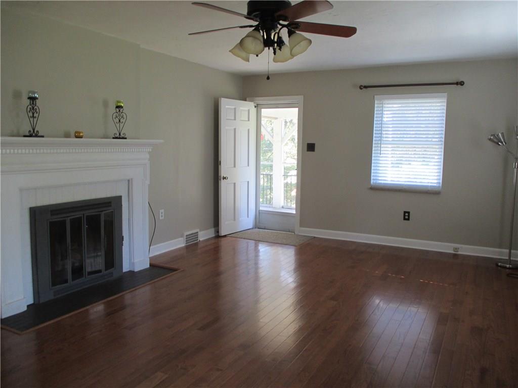 1900 Tuscarawas Road Beaver, PA 15009 - Photo 6 of 25 Living room with view of gas fireplace and screened patio