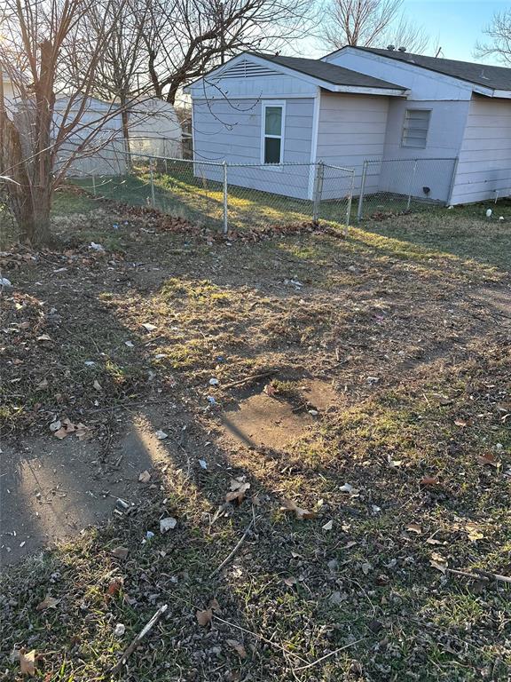 60 Pershing Drive, Unit A Denison, TX 75020 - Photo 11 of 11 a view of a house with a yard