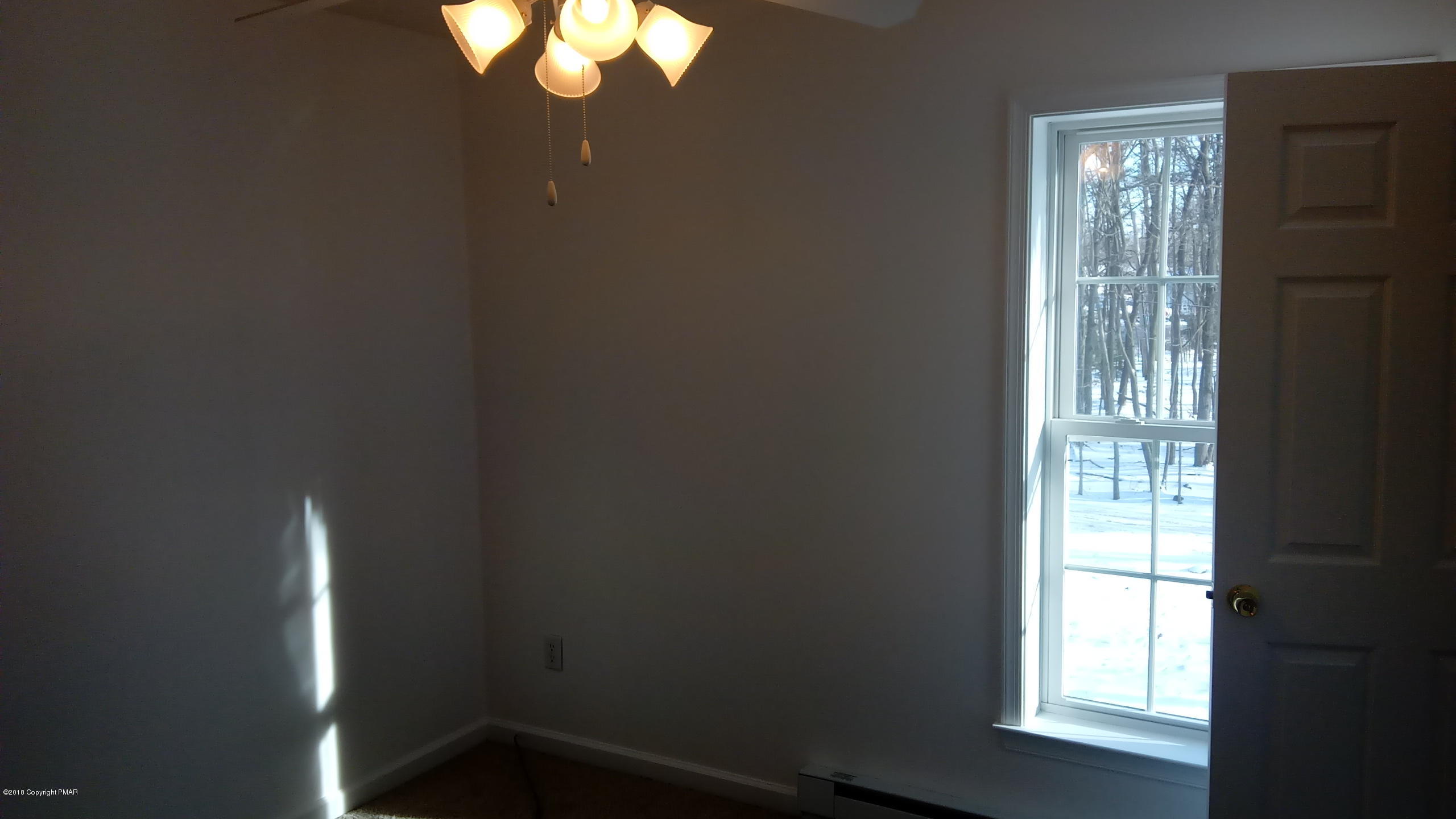 2302 Winchester Road Pocono Summit, PA 18346 - Photo 23 of 25 a view of empty room with window