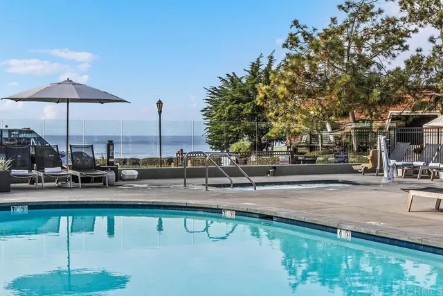 a kitchen with lots of counter top space and dining table