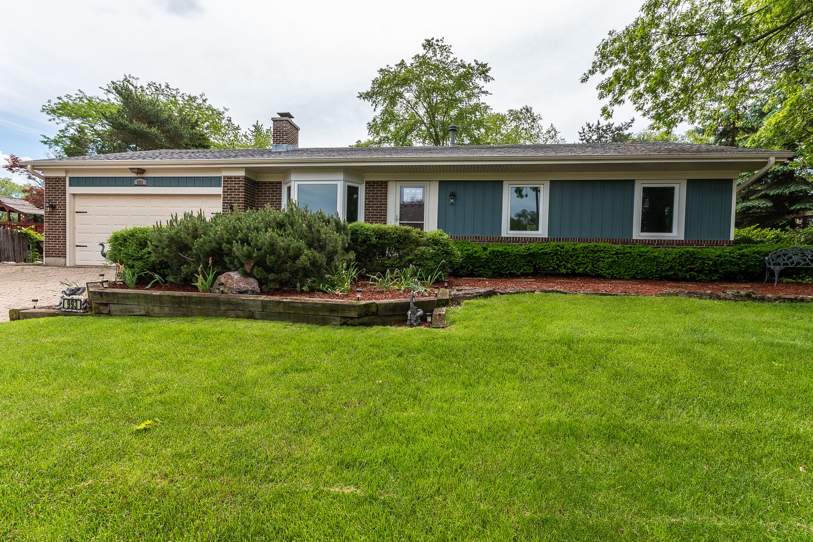 993 Pheasant Ridge Drive Lake Zurich, IL 60047 - Photo 1 of 25 a front view of house with yard and green space