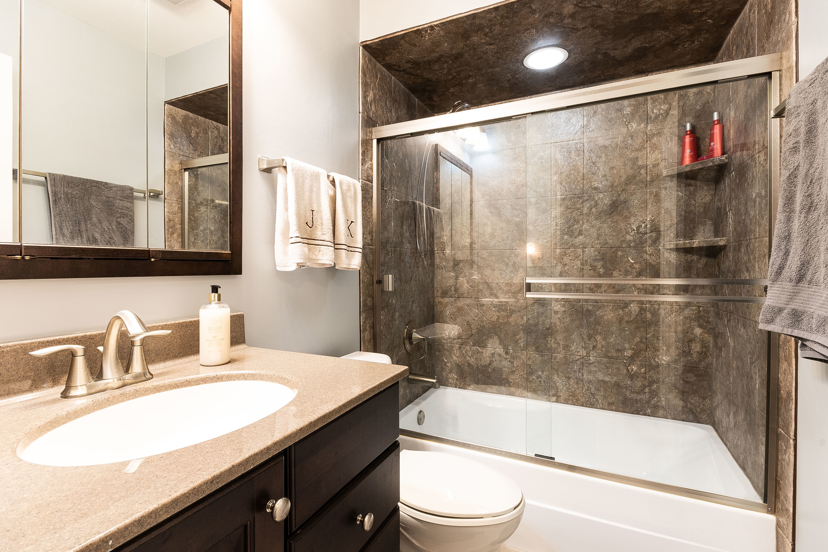 993 Pheasant Ridge Drive Lake Zurich, IL 60047 - Photo 11 of 25 a bathroom with a granite countertop bathtub shower sink vanity and toilet