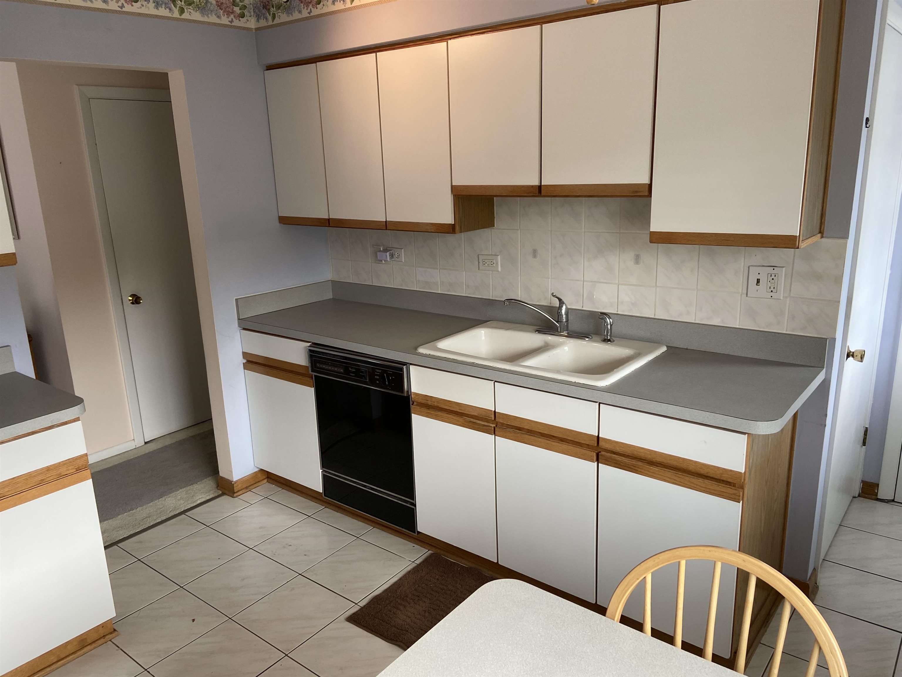 645 Sable Avenue Addison, IL 60101 - Photo 20 of 33 a kitchen with stainless steel appliances granite countertop a sink and a stove