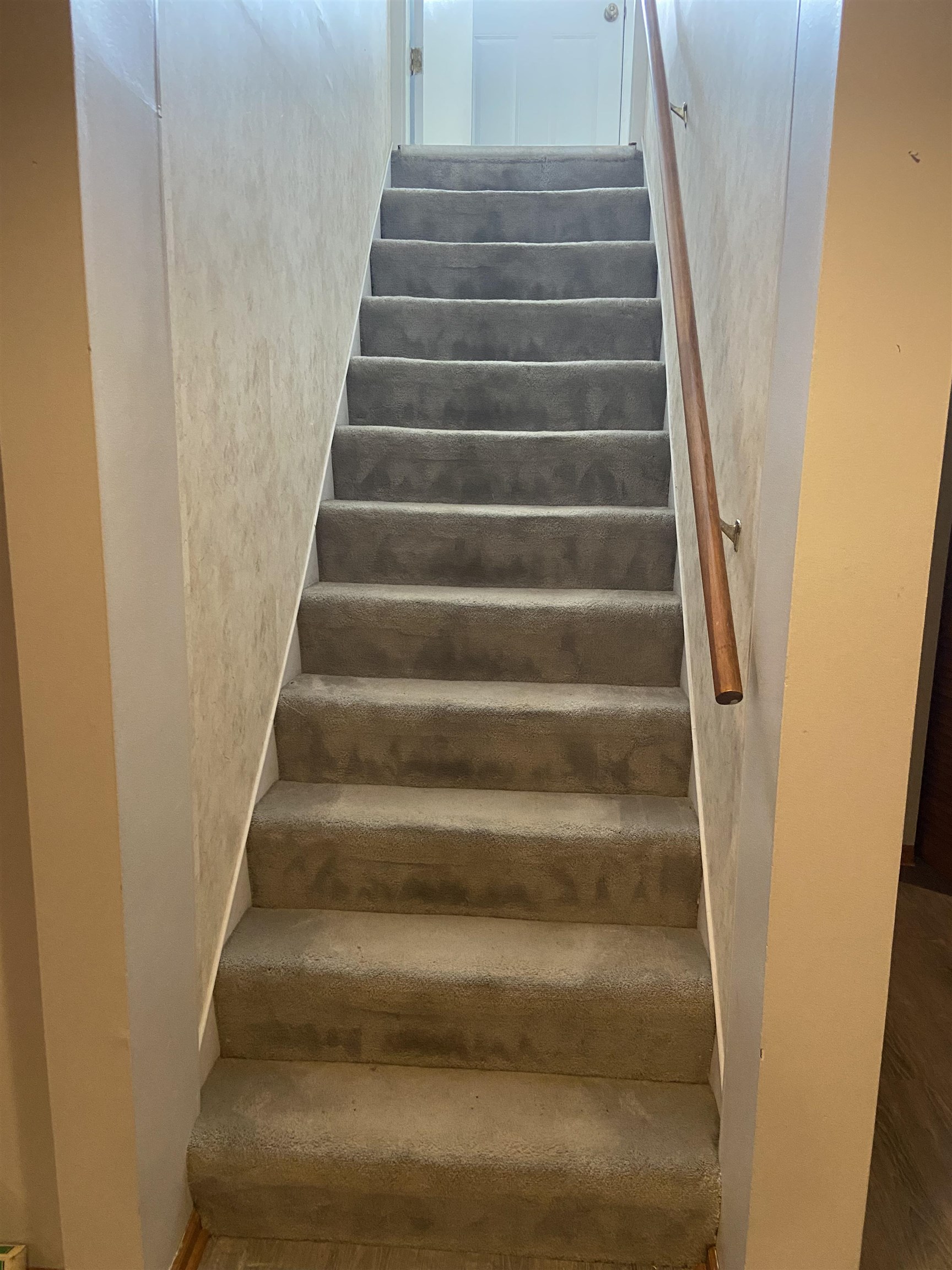 645 Sable Avenue Addison, IL 60101 - Photo 24 of 33 a view of staircase with empty racks