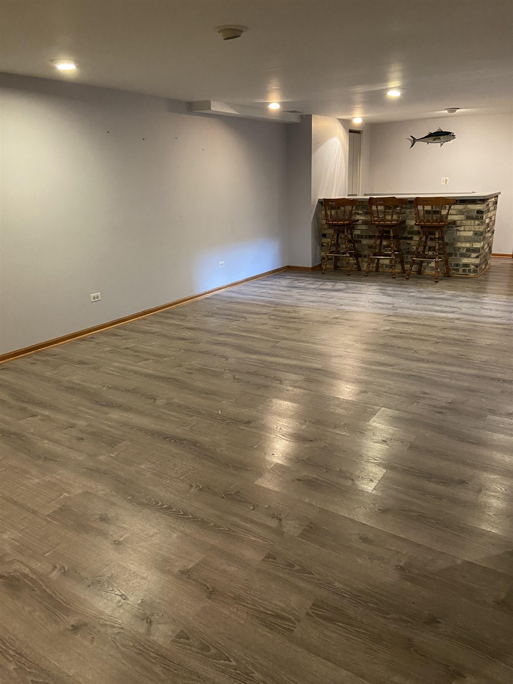 645 Sable Avenue Addison, IL 60101 - Photo 28 of 33 an empty room with wooden floor