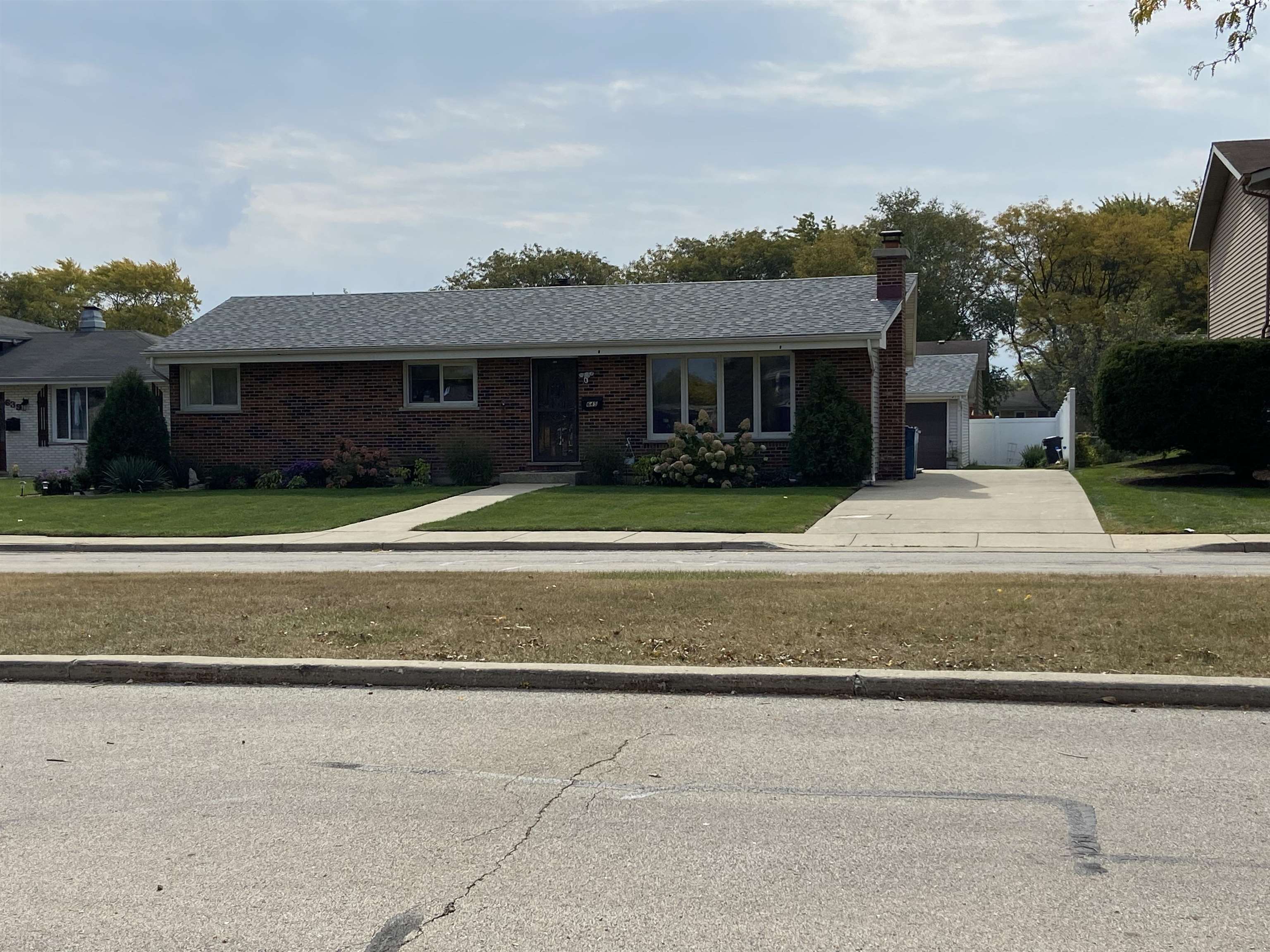645 Sable Avenue Addison, IL 60101 - Photo 33 of 33 a front view of a house with a yard and garage
