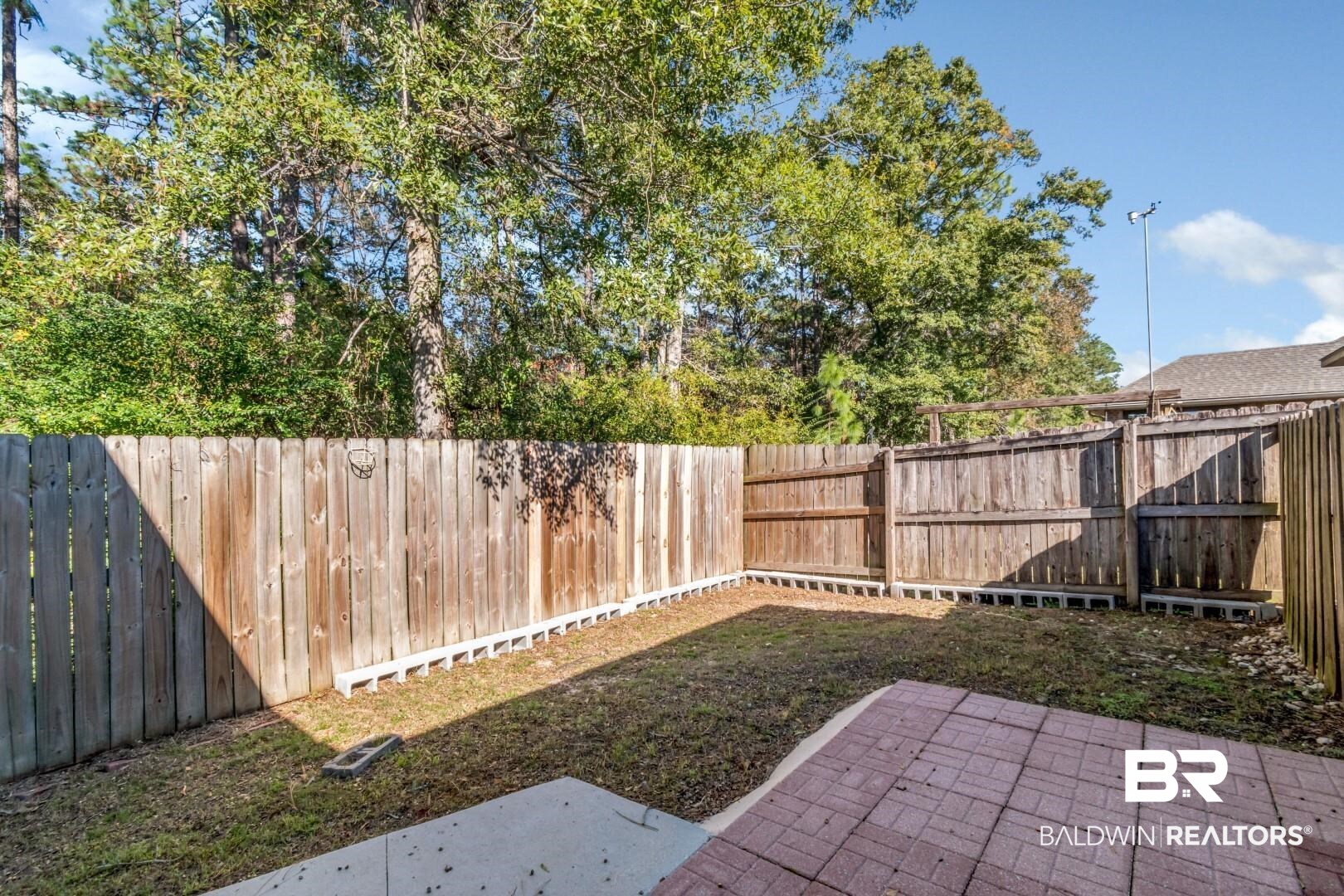 6144 Whitebark Drive Mobile, AL 36693 - Photo 27 of 33 View of yard featuring a patio