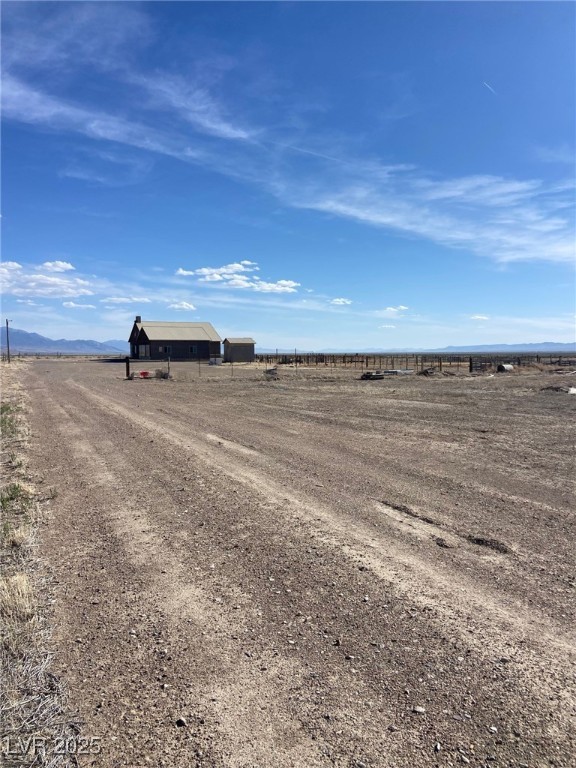 1314 Fire Station Road Ely, NV 89301 - Photo 13 of 35 View of dirt / gravel driveway with a view of rura