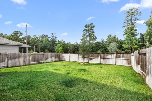 a view of a backyard with a garden