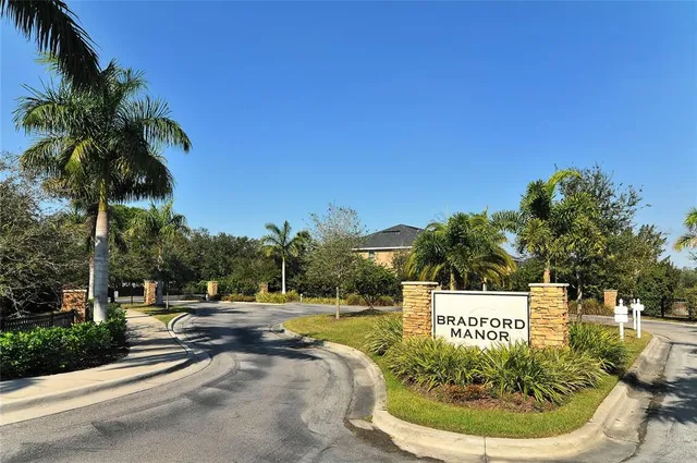 a view of a swimming pool with a sitting area