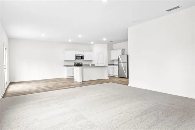 a view of a kitchen with a sink
