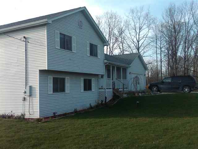 3555 Connors Road Emmett, MI 48022 - Photo 29 of 30 This is a front angle view of the home.
