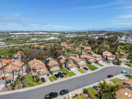an aerial view of residential building and green space