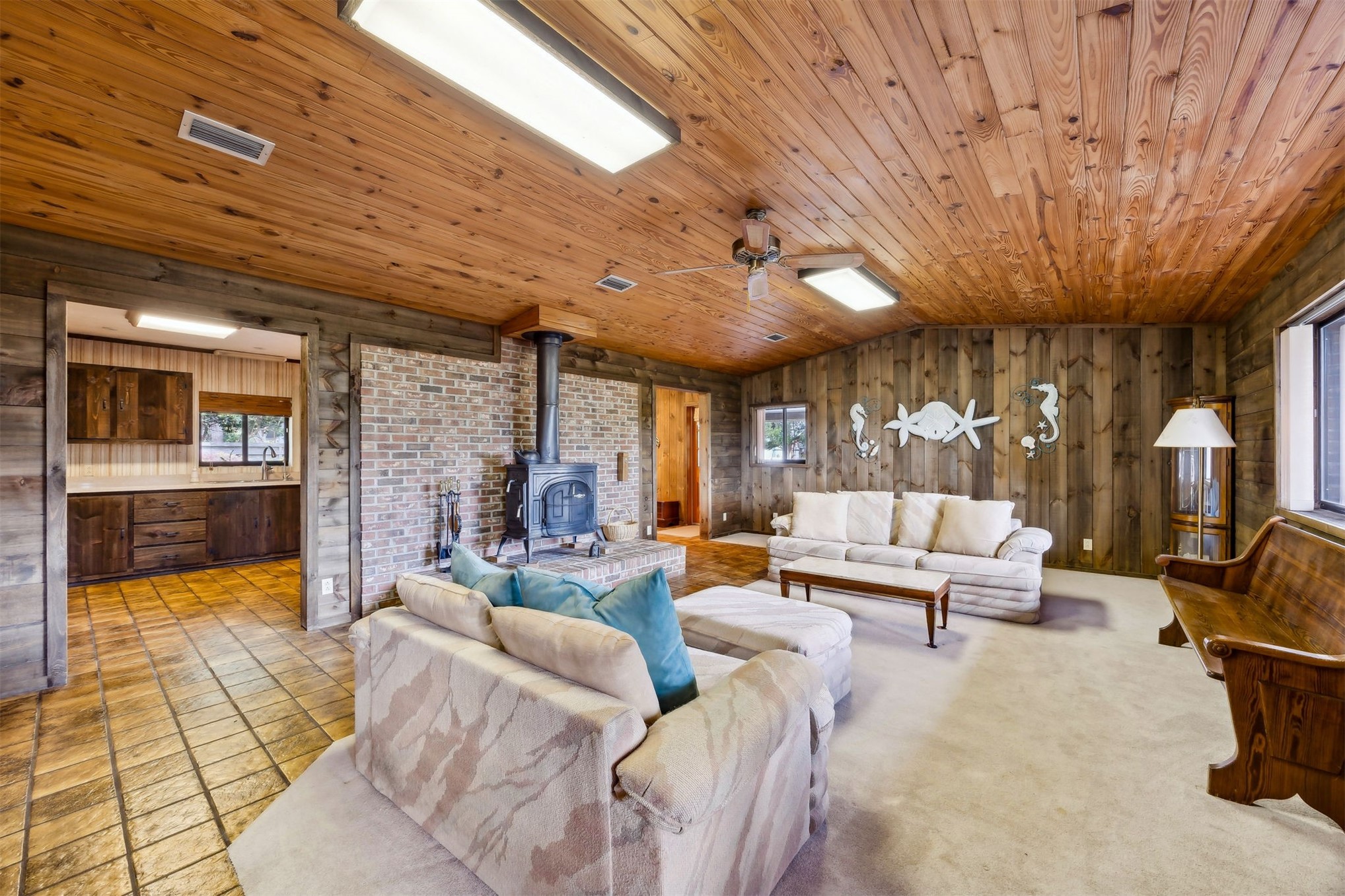 96111 Pirates Bluff Road Yulee, FL 32097 - Photo 11 of 52 a living room with furniture a fireplace and a table