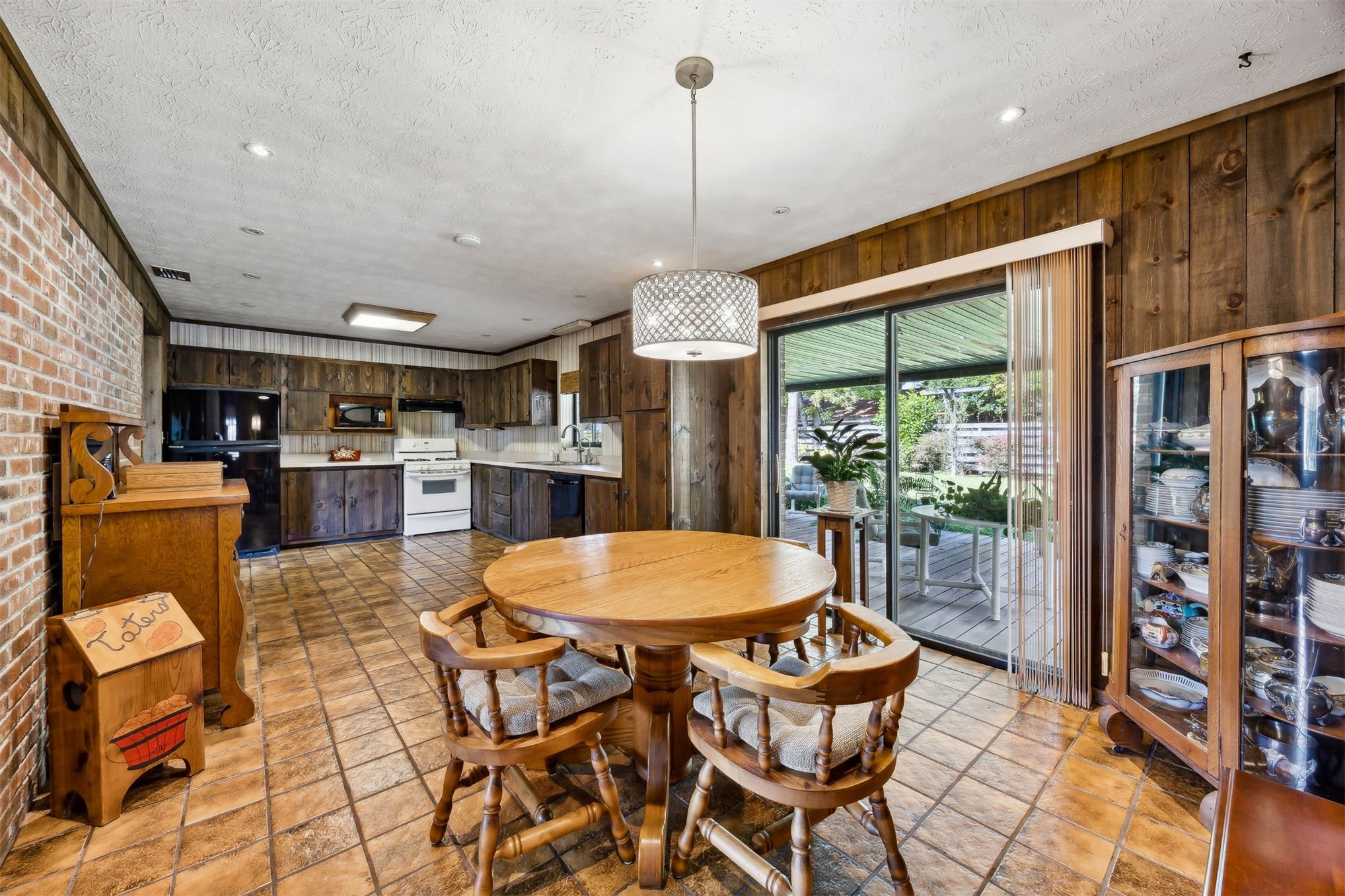 96111 Pirates Bluff Road Yulee, FL 32097 - Photo 12 of 52 a view of a dining room with furniture window and wooden floor