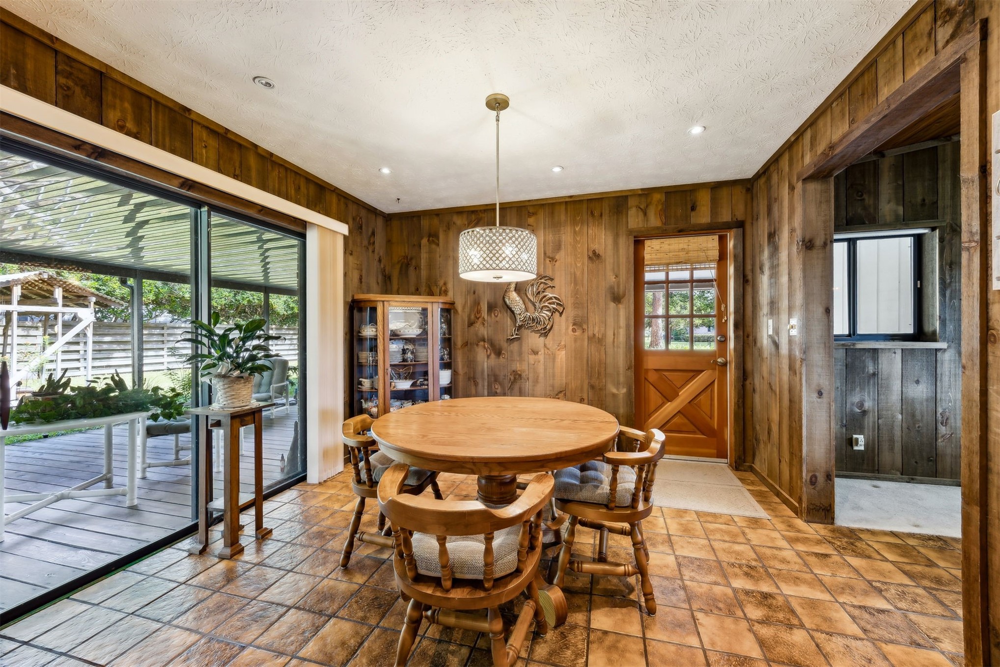 96111 Pirates Bluff Road Yulee, FL 32097 - Photo 13 of 52 a dining room filled with glass top table and chairs