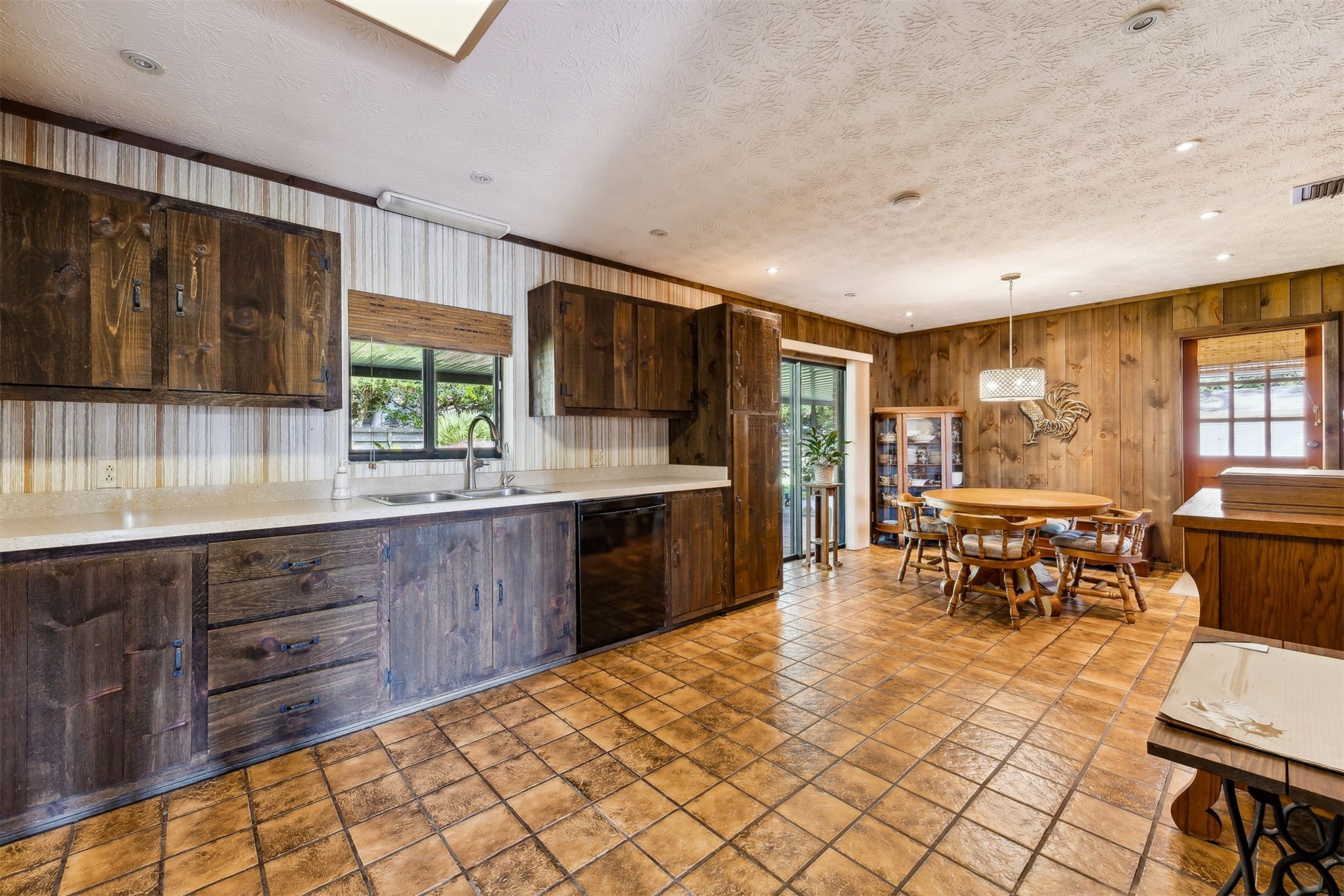 96111 Pirates Bluff Road Yulee, FL 32097 - Photo 16 of 52 a large kitchen with lots of table and chairs