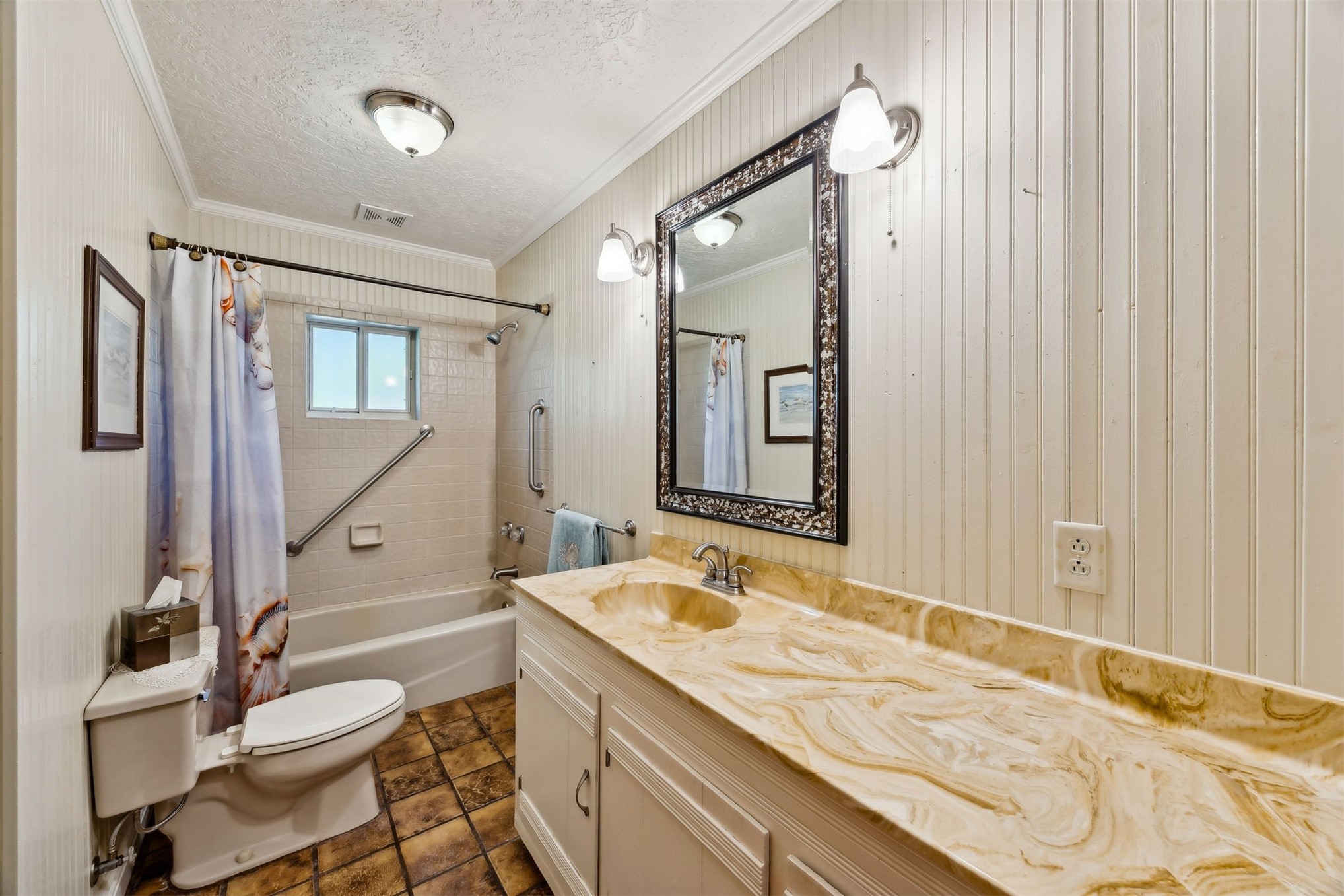 96111 Pirates Bluff Road Yulee, FL 32097 - Photo 22 of 52 a bathroom with a granite countertop sink toilet and shower
