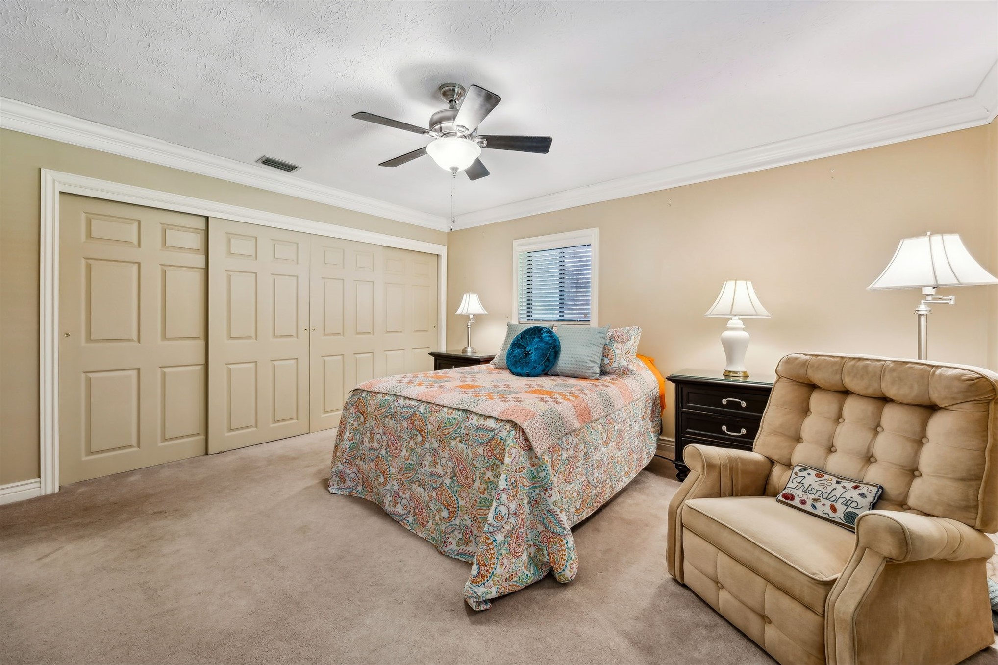 96111 Pirates Bluff Road Yulee, FL 32097 - Photo 24 of 52 a spacious bedroom with a bed and closet