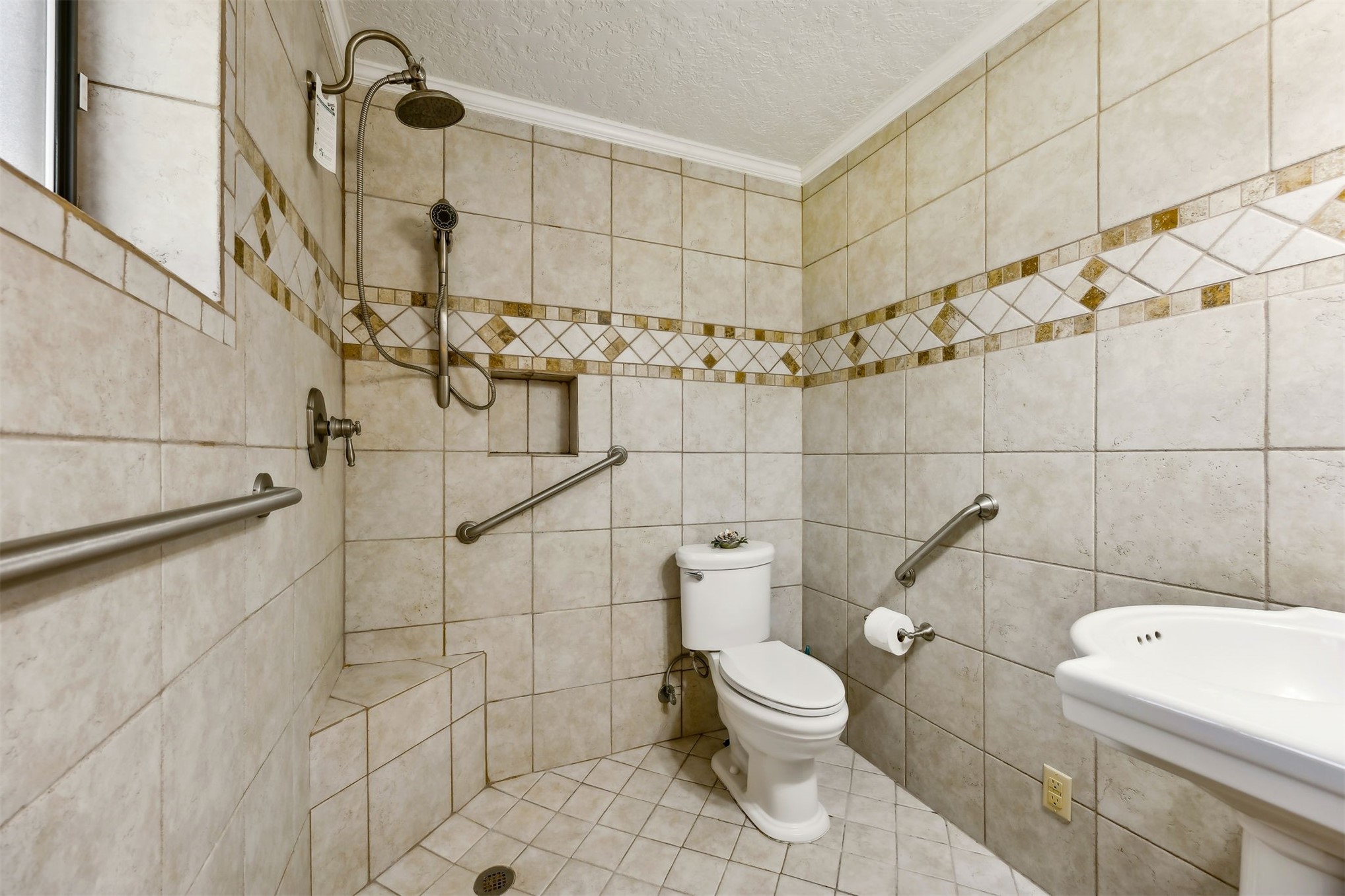 96111 Pirates Bluff Road Yulee, FL 32097 - Photo 25 of 52 a white toilet sitting next to a bathroom sink