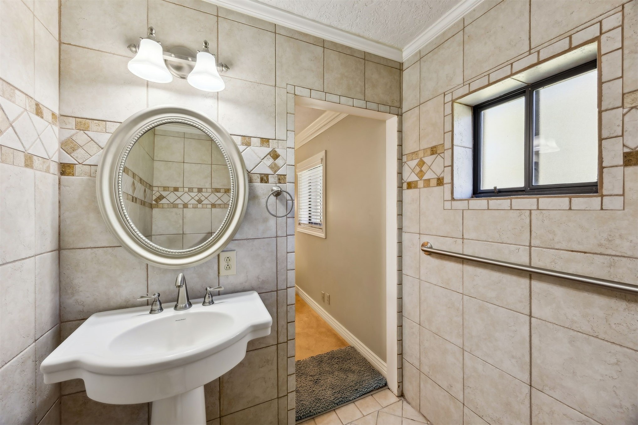 96111 Pirates Bluff Road Yulee, FL 32097 - Photo 26 of 52 a bathroom with a sink and a mirror