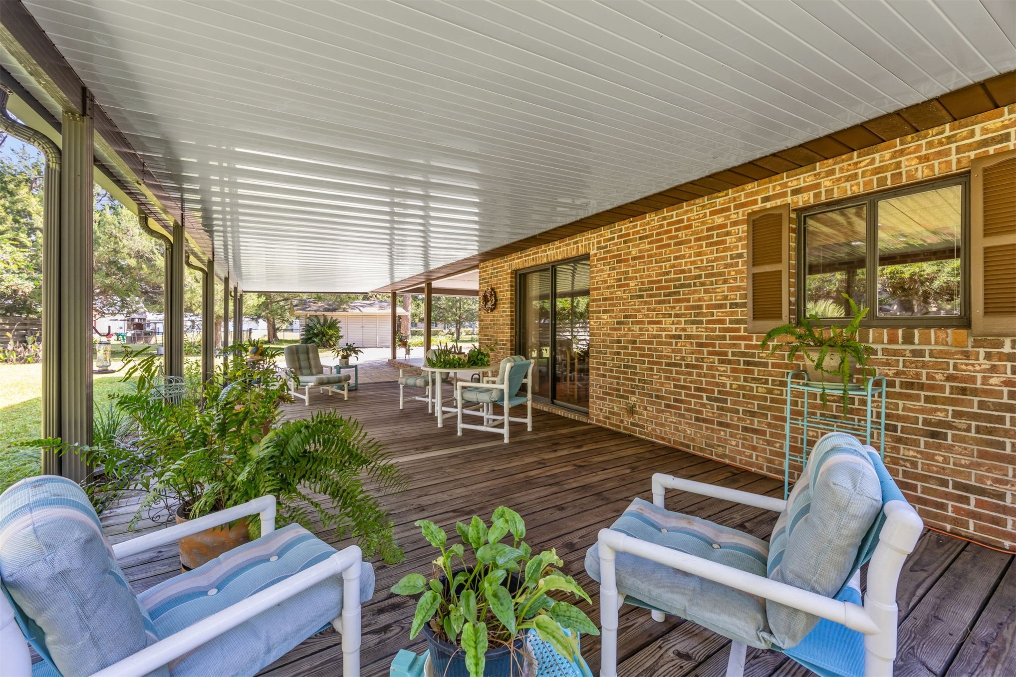 96111 Pirates Bluff Road Yulee, FL 32097 - Photo 30 of 52 a outdoor living space with patio furniture
