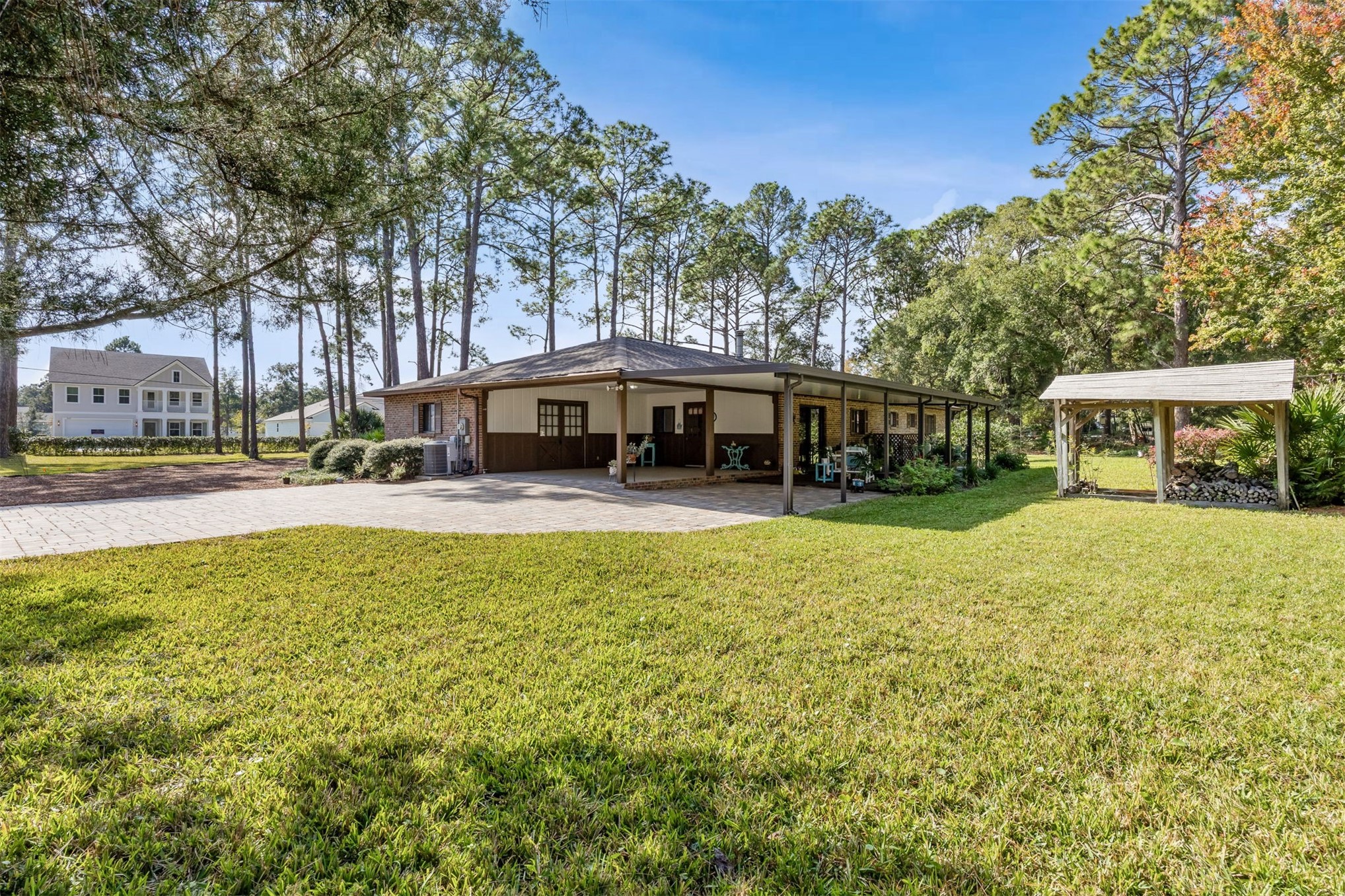96111 Pirates Bluff Road Yulee, FL 32097 - Photo 39 of 52 a view of house with a swimming pool