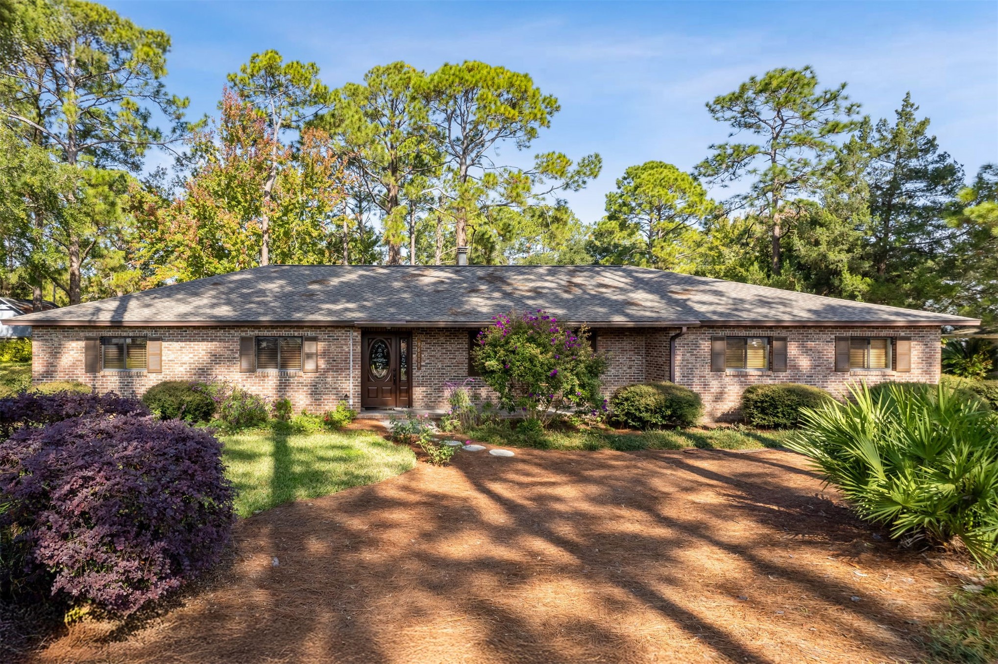 96111 Pirates Bluff Road Yulee, FL 32097 - Photo 41 of 52 a front view of a house with a yard