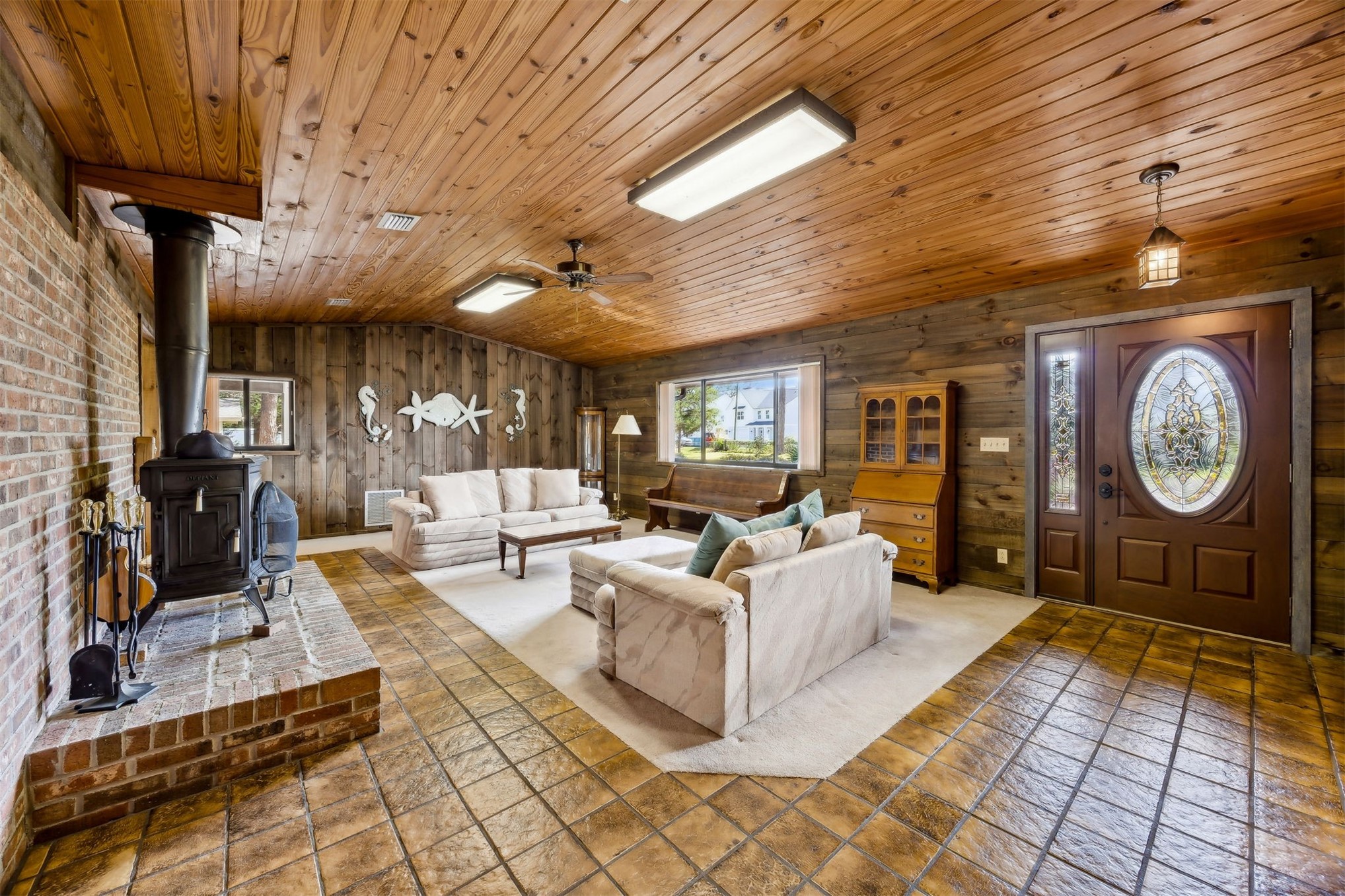 96111 Pirates Bluff Road Yulee, FL 32097 - Photo 5 of 52 a living room with furniture a clock on wall and a clock