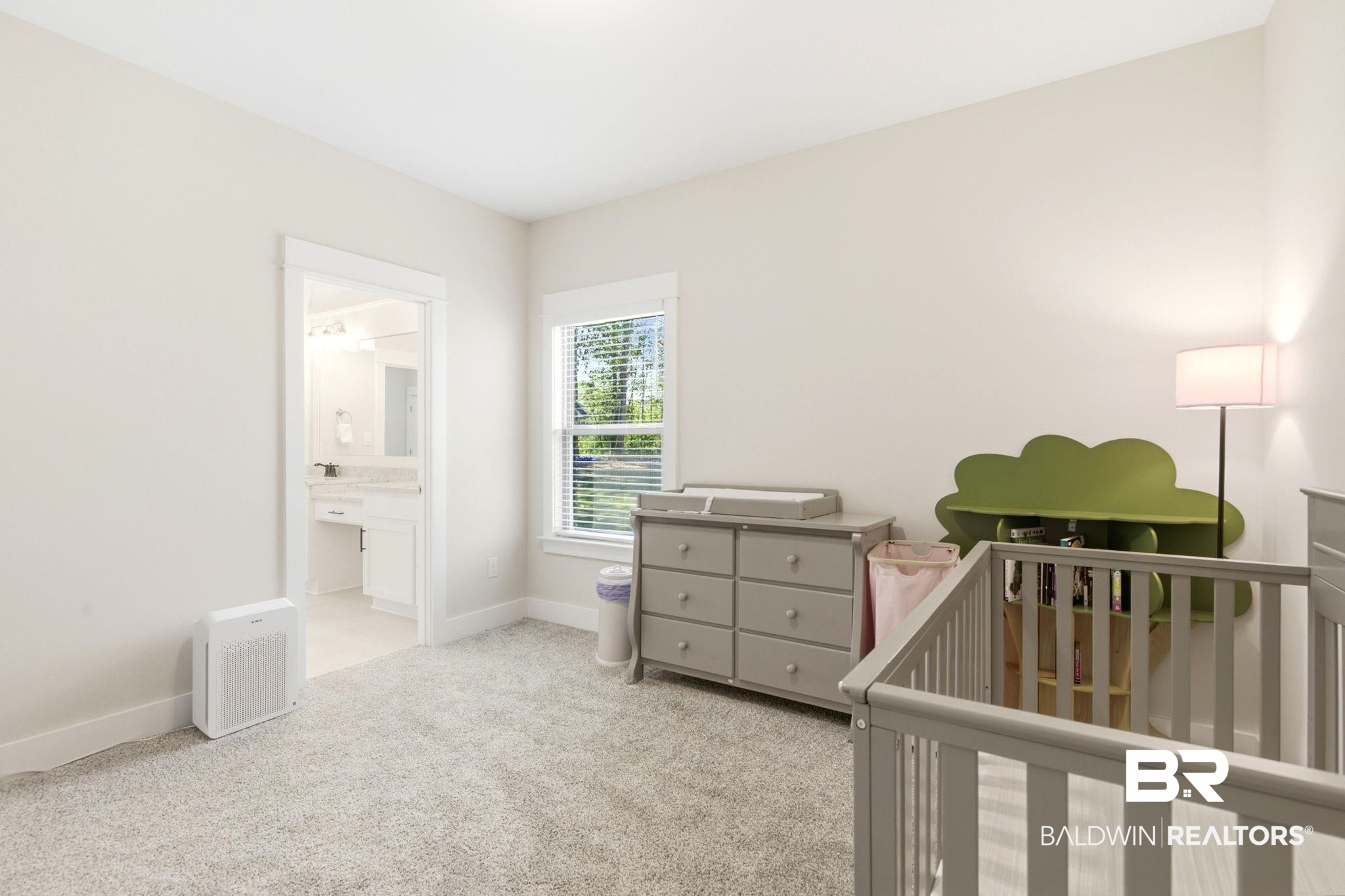 12132 Exbury Way Daphne, AL 36527 - Photo 23 of 47 Bedroom featuring light colored carpet, a crib, and ensuite bath