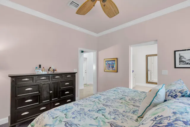 a bathroom with a sink vanity and mirror