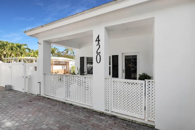 a view of a chairs and table in a room