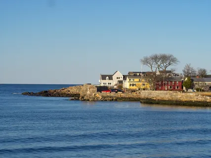 a view of swimming pool with furniture
